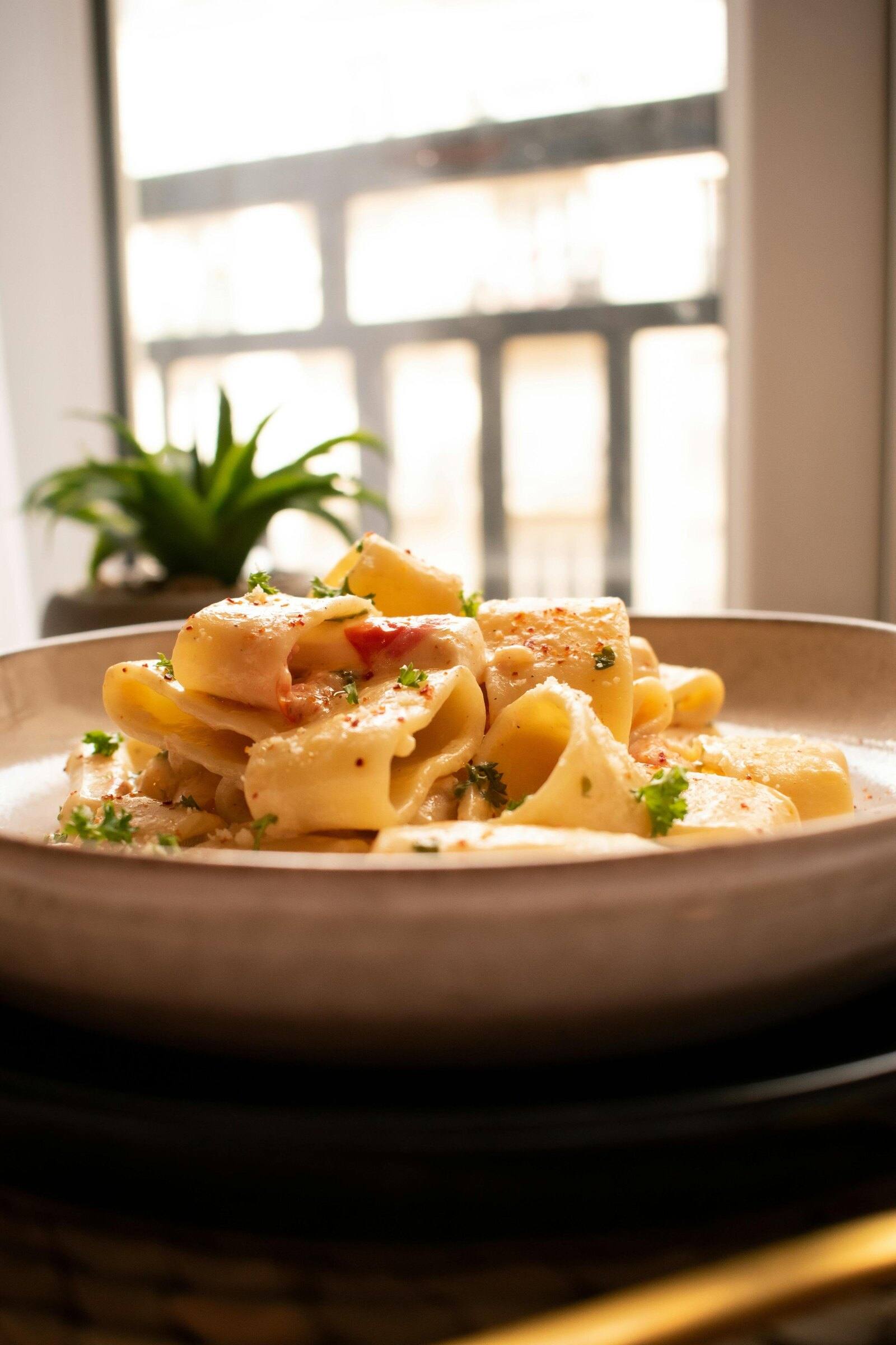Creamy pasta ribbons in a bowl
